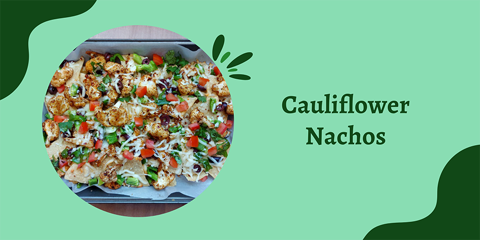 A woman in athletic wear sitting on a yoga mat indoors, smiling.